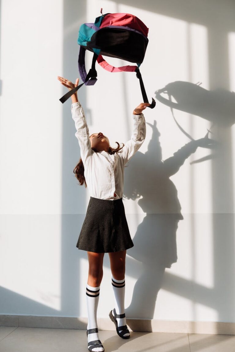 Girl in School Uniform Throwing Her Backpack